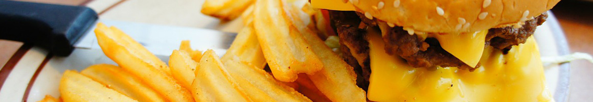 Eating Burger Diner Hot Dog at Rod's Grille restaurant in Warren, RI.